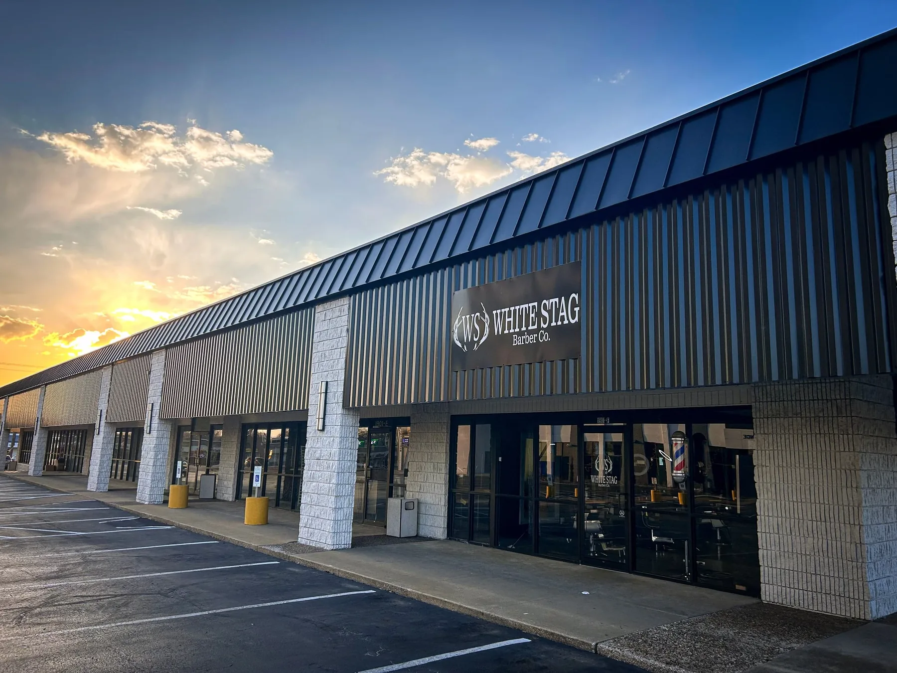 White Stag Barber Co. storefront on South Glenstone at sunset