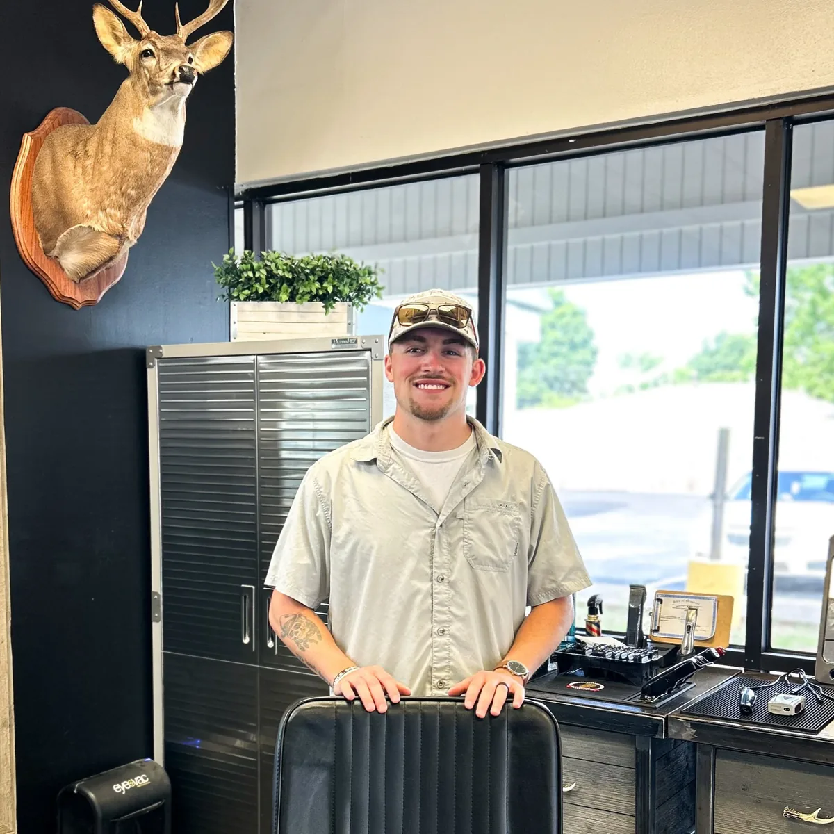 Reed, owner and operator of White Stag Barber Co.